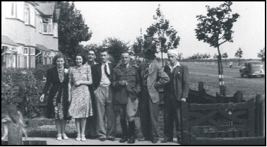  ETIENNE & VIOLETTE'S FATHER  OUTSIDE THEIR HOME IN HARMONDSWORTH 